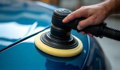 Car hood being professionally polished at Spotless Auto Spa